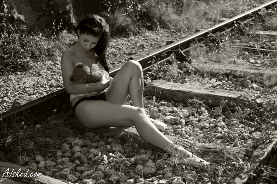 woman with lingerie on a railway